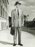 Man in Full Suit Standing on Sidewalk  (Portrait)