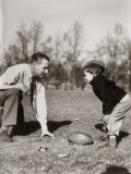 Father and Son Playing Football