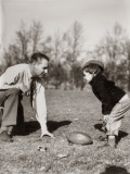 Father and Son Playing Football