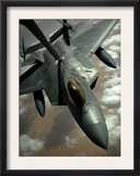 A US Air Force F-22 Raptor Is Refueled by a Kc-10A Extender Aircraft over Southwest Asia
