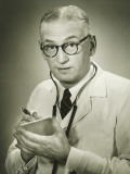 Doctor Holding Note Pad Posing in Studio  Portrait