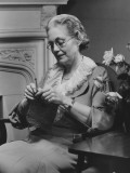 Senior Woman Knitting in Living Room
