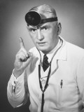 Portrait of Doctor With Eye Test Equipment and Stethoscope