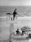 Life-Guard Looking Over Water