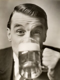 Man Drinking Mug of Beer