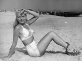 Young Woman in White Bikini on Beach