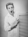 Astonished Nurse in Consulting Room