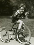 Little Boy Riding His Tricycle