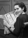 Woman Reading Newspaper
