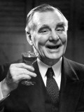Man Holding Up Drink