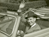 Man Waving From Car