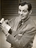 Man Filling Out a Form
