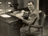 Businessman Holding Check