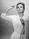 Nurse Reading Thermometer