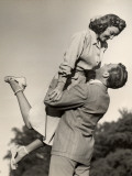 Man Holding Woman