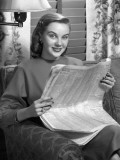 Woman Reading Newspaper