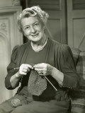 Smiling Woman Knitting