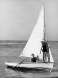 Couple on Small Sail Boat