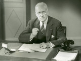 Man Sitting Behind Desk