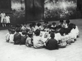 Circle of Children Reading