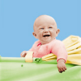 Smiling Baby in a Baby Carriage