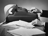 Hands Using Adding Machine