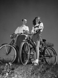 Couple Standing With Bicycles