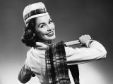 Woman Wearing Glengarry Cap and Tartan