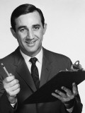 Man Holding Clipboard and Pencil