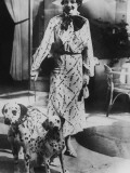 Woman With Two Dalmatians Wearing Patterned Dress