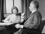 Man Talking  Woman Taking Notes