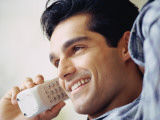 Man Talking on Cordless Phone