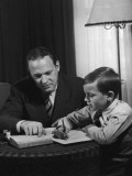 Father Helping Son With Homework