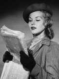 Woman Reading Newspaper