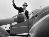 Man Waving  Getting in Plane