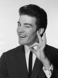 Man Smiling and Gesturing