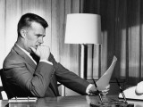 Man Reading Document