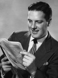 Man Looking at Paper