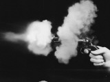Close-Up of Gun Being Fired