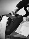 Hand Using Adding Machine