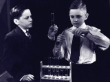 Two Boys (10-12) Doing Chemistry Experiment