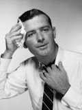 Man Wiping Forehead