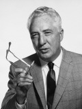 Man Talking  Holding Glasses