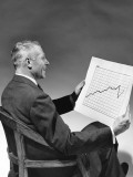 Man Looking at Chart