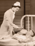 Nurse Taking Male Patients Temperature