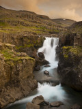 Waterfall in Berufjordur Fjord  Iceland