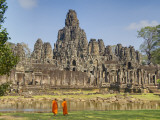 Monks Looking at Bayon Temple  Angkor  Siem Reap  Cambodia