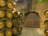 Oak Barrels Stacked Outside of Door at Ironstone Winery  Calaveras County  California  USA