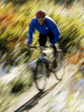 Recreational Mountain Biker Riding on the Trails