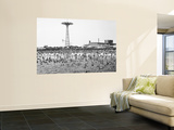 Bathers Enjoying Coney Island Beaches Parachute Ride and Steeplechase Park Visible in the Rear